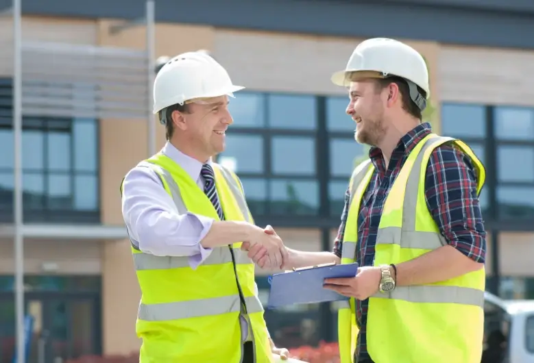 California contractor congratulating another contractor after passing the CSLB license exam